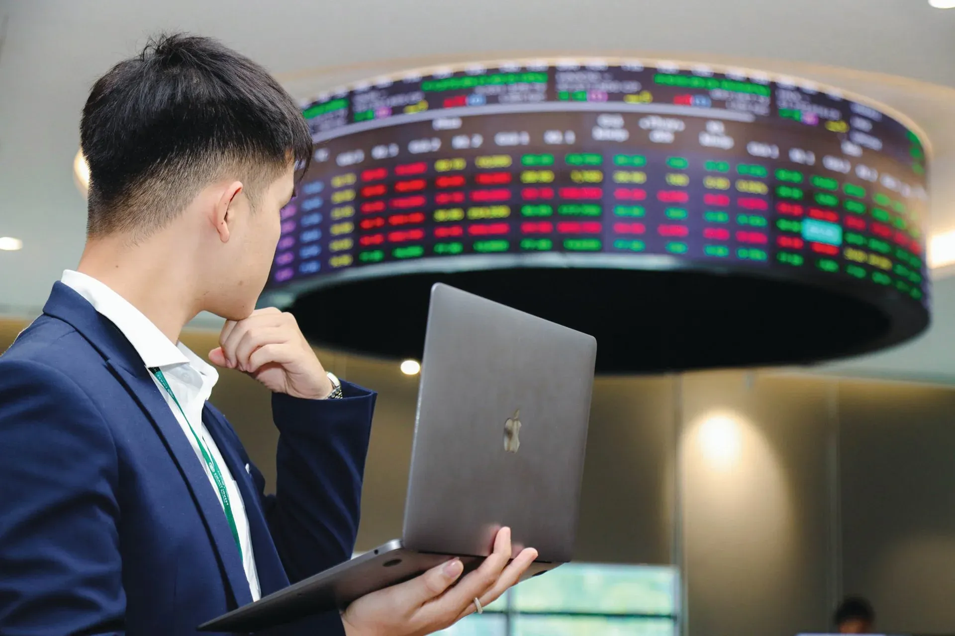 Investor analyzing FTSE upgrade opportunities