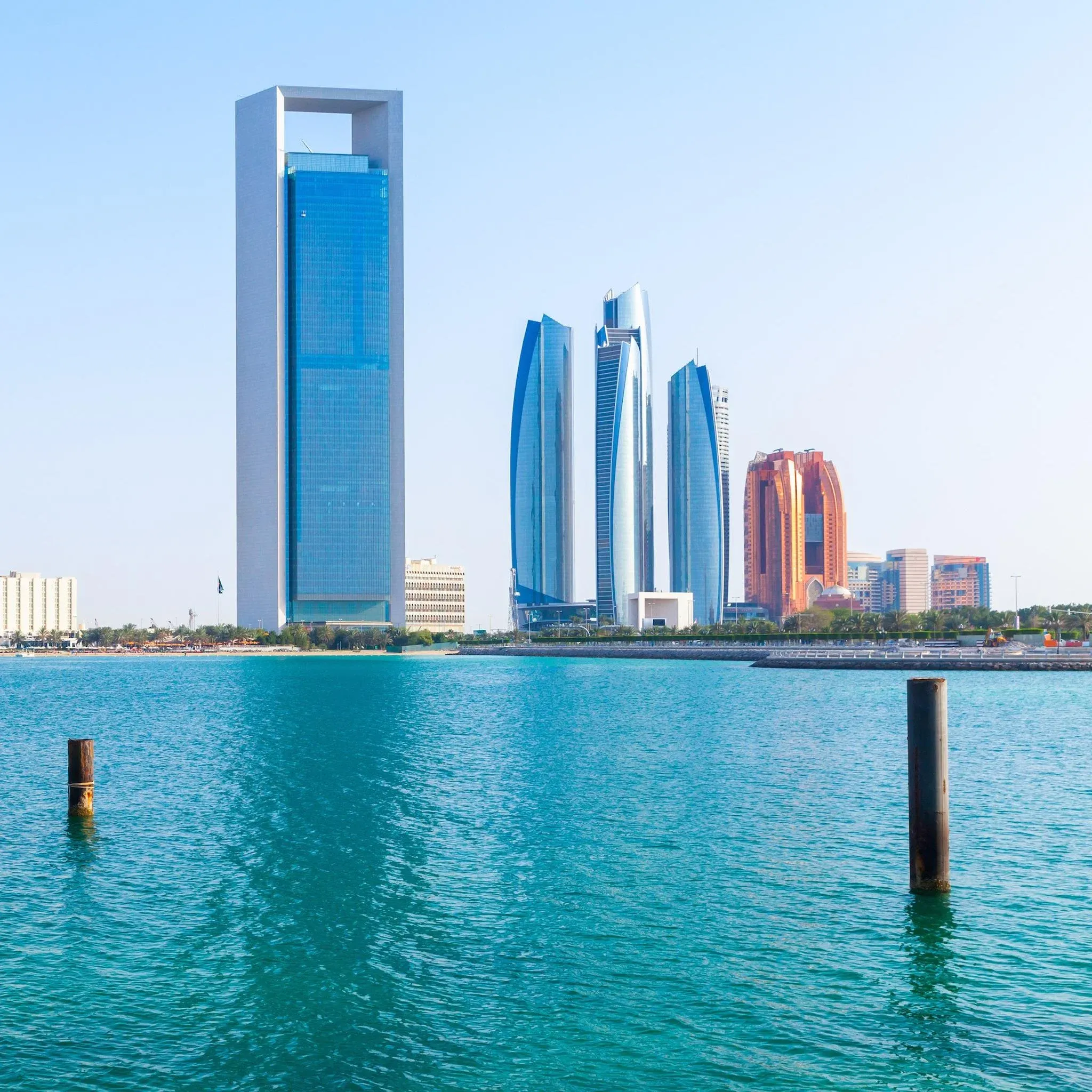 Abu Dhabi skyline with the ADNOC tower — symbol of a UAE freed from OPEC's production ceiling