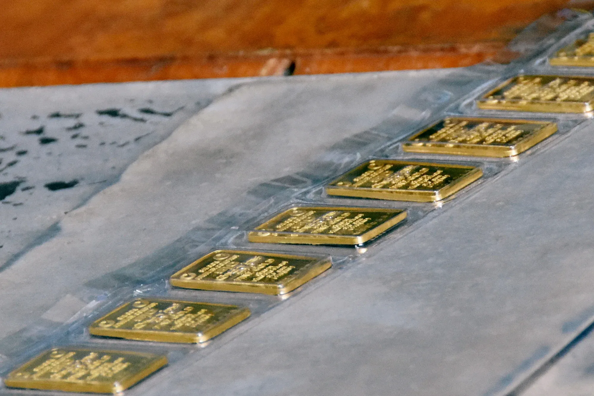 Gold bars on a production line