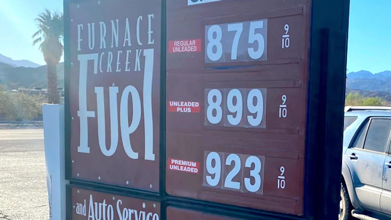 US gas station with record-high price displays, reflecting inflation pressure on consumers