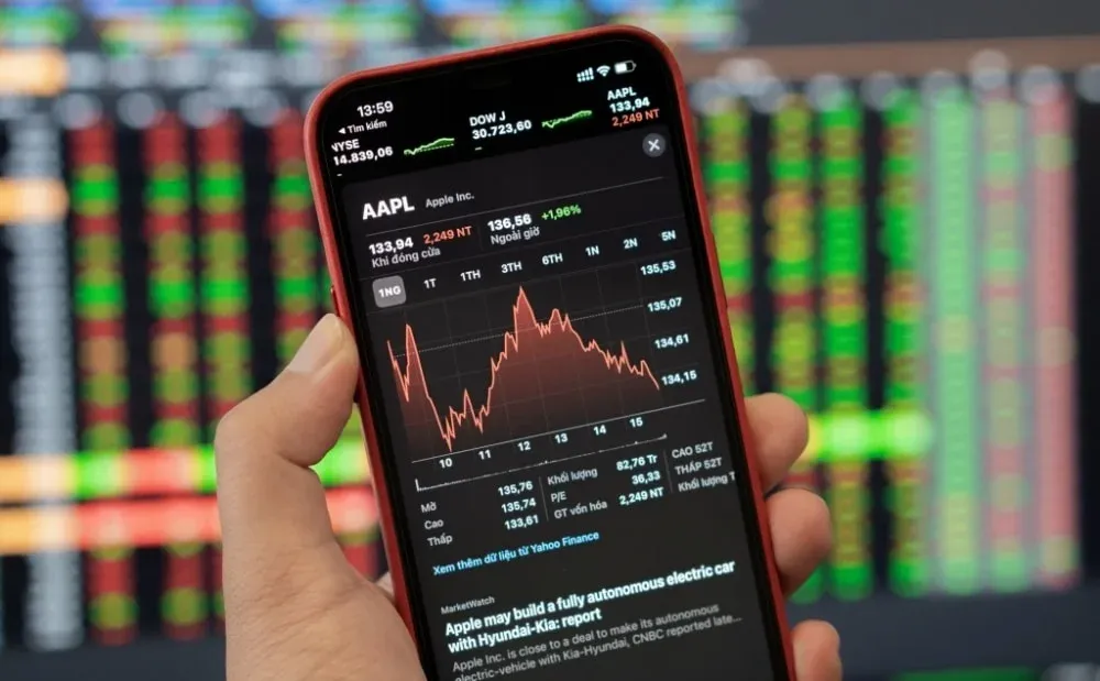 A retail investor reviewing their portfolio ahead of the upgrade effective date