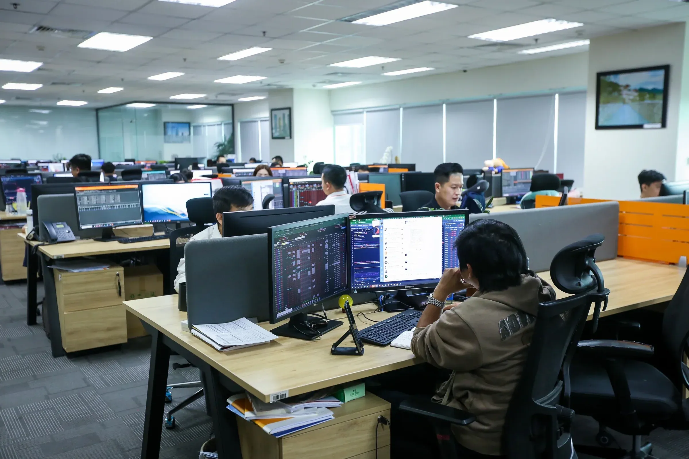 Investors monitoring the stock market