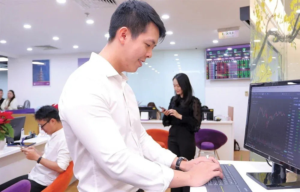 Investors monitoring Vietnam's securities and bond markets