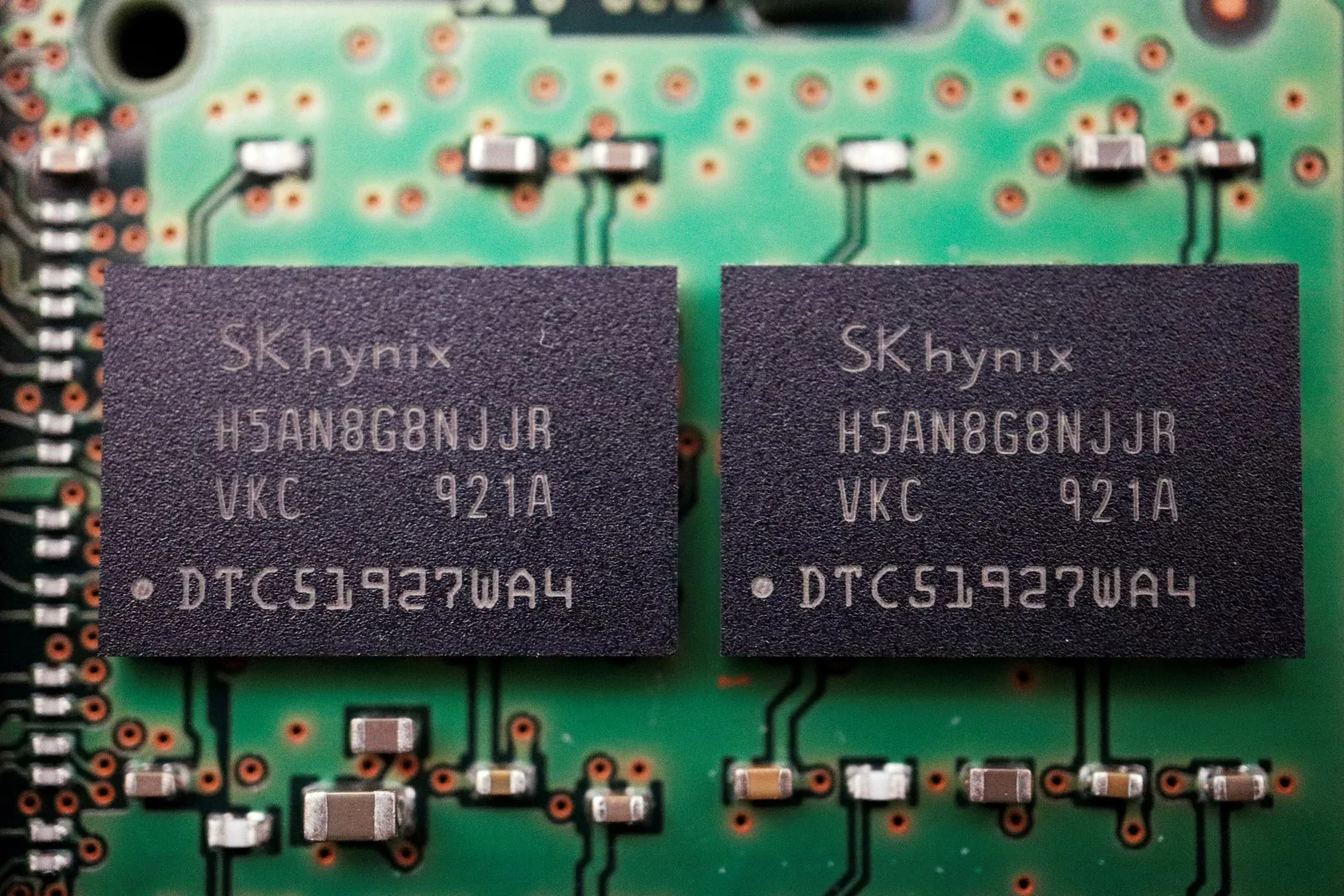 SK Hynix memory chips on a circuit board, representing the global HBM shortage cycle