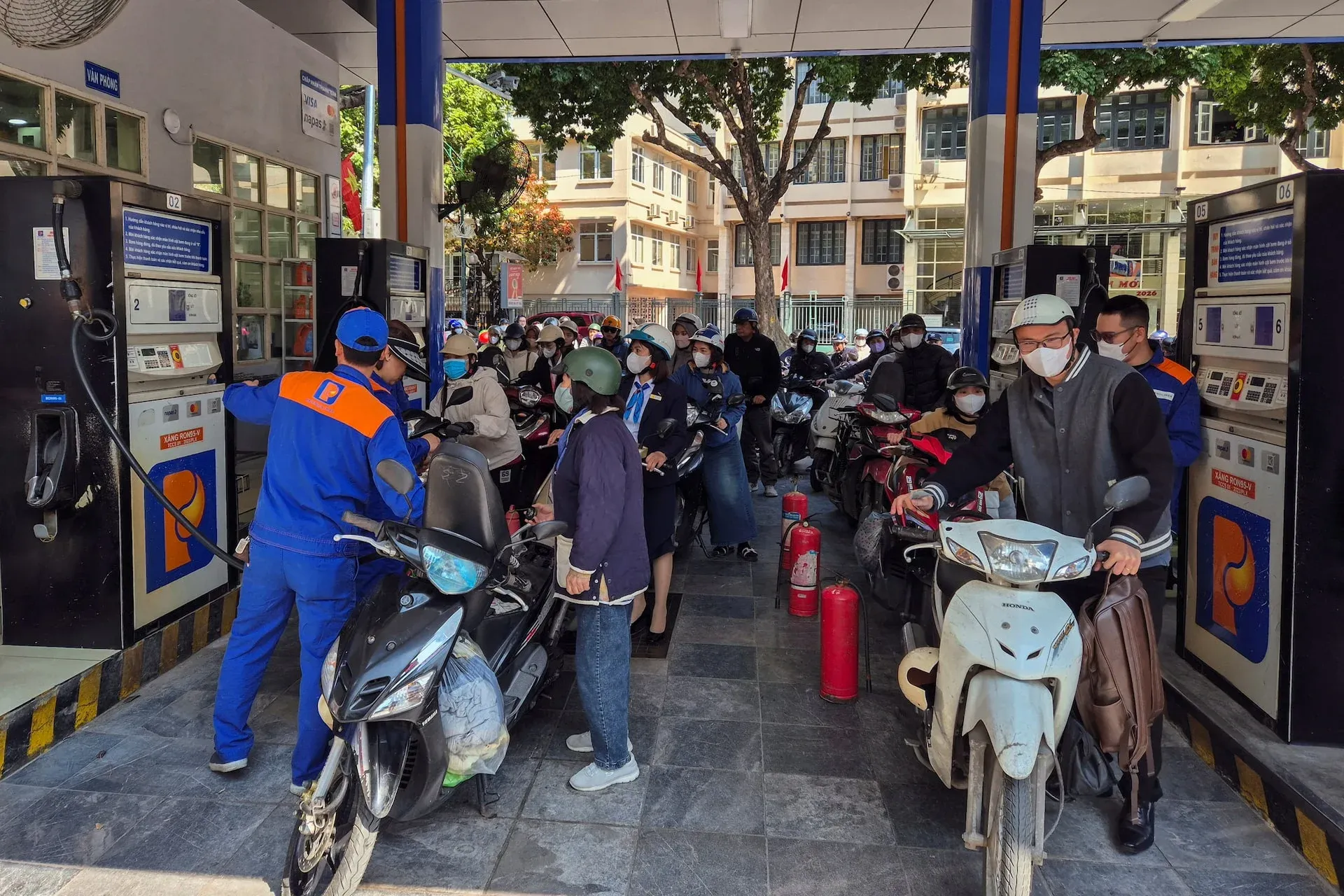Petrolimex gas station in Vietnam with people queuing to refuel