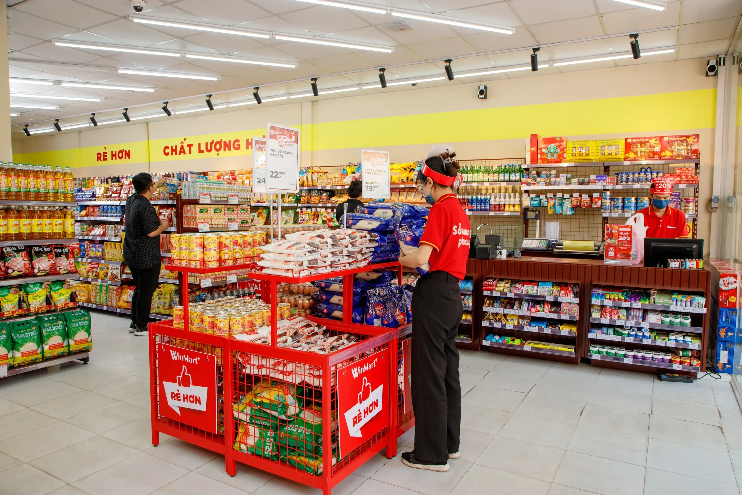 Inside a WinMart+ store: diverse product offering and store staff