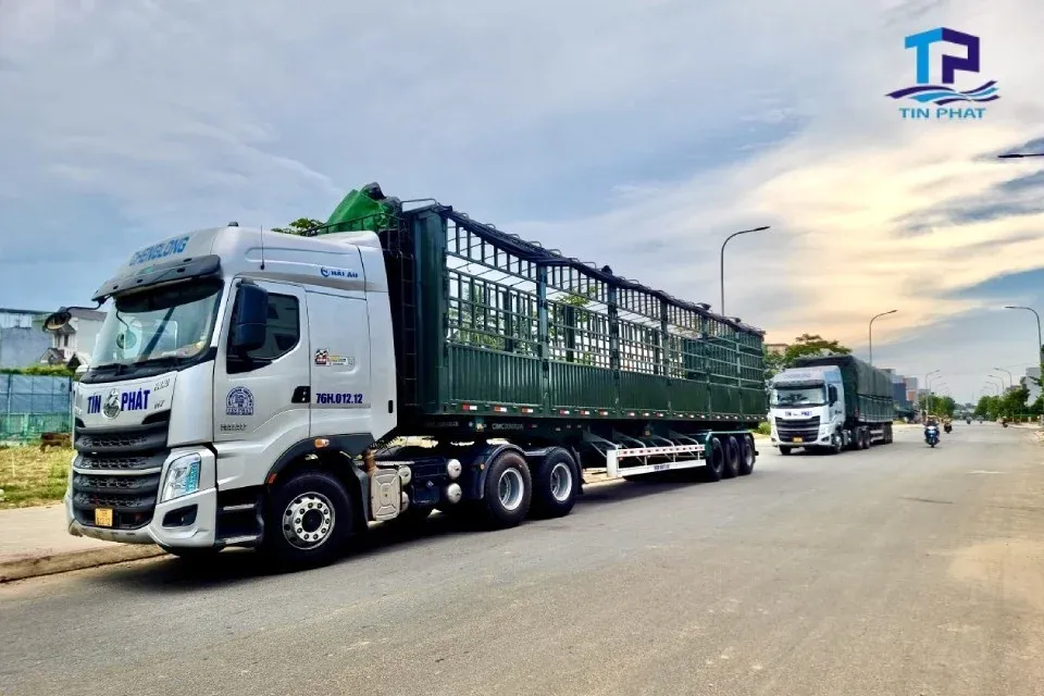 Heavy trucks on a Vietnamese expressway